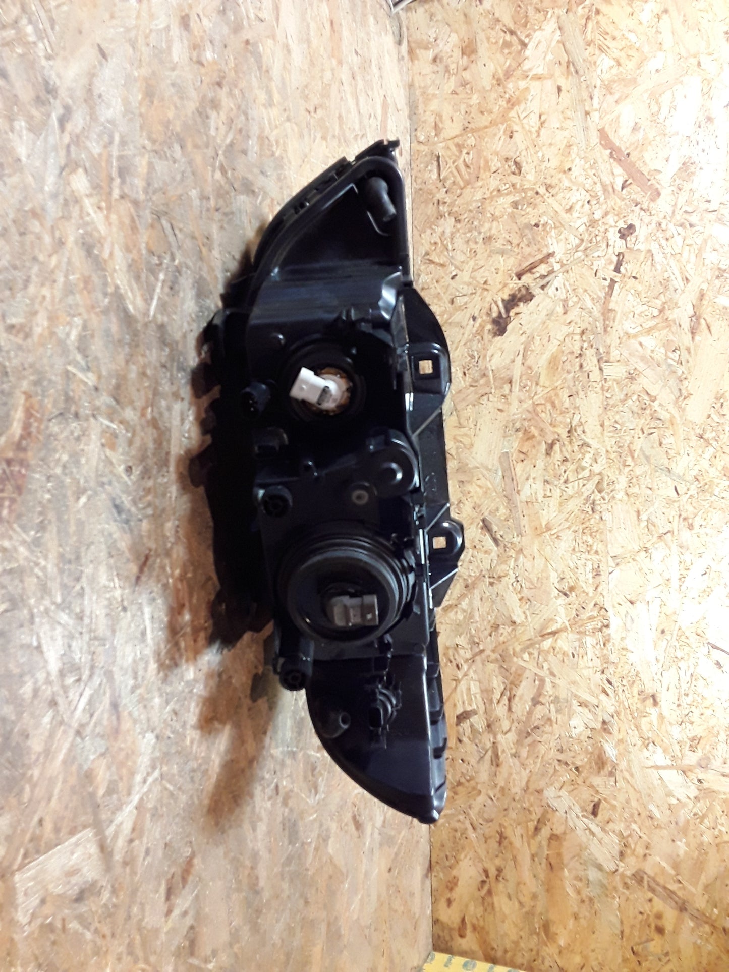 BMW 5er (E39) Hauptscheinwerfer links schwarz original Hella NEU