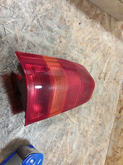 Kadett E Heckleuchte links original GM Opel NEU