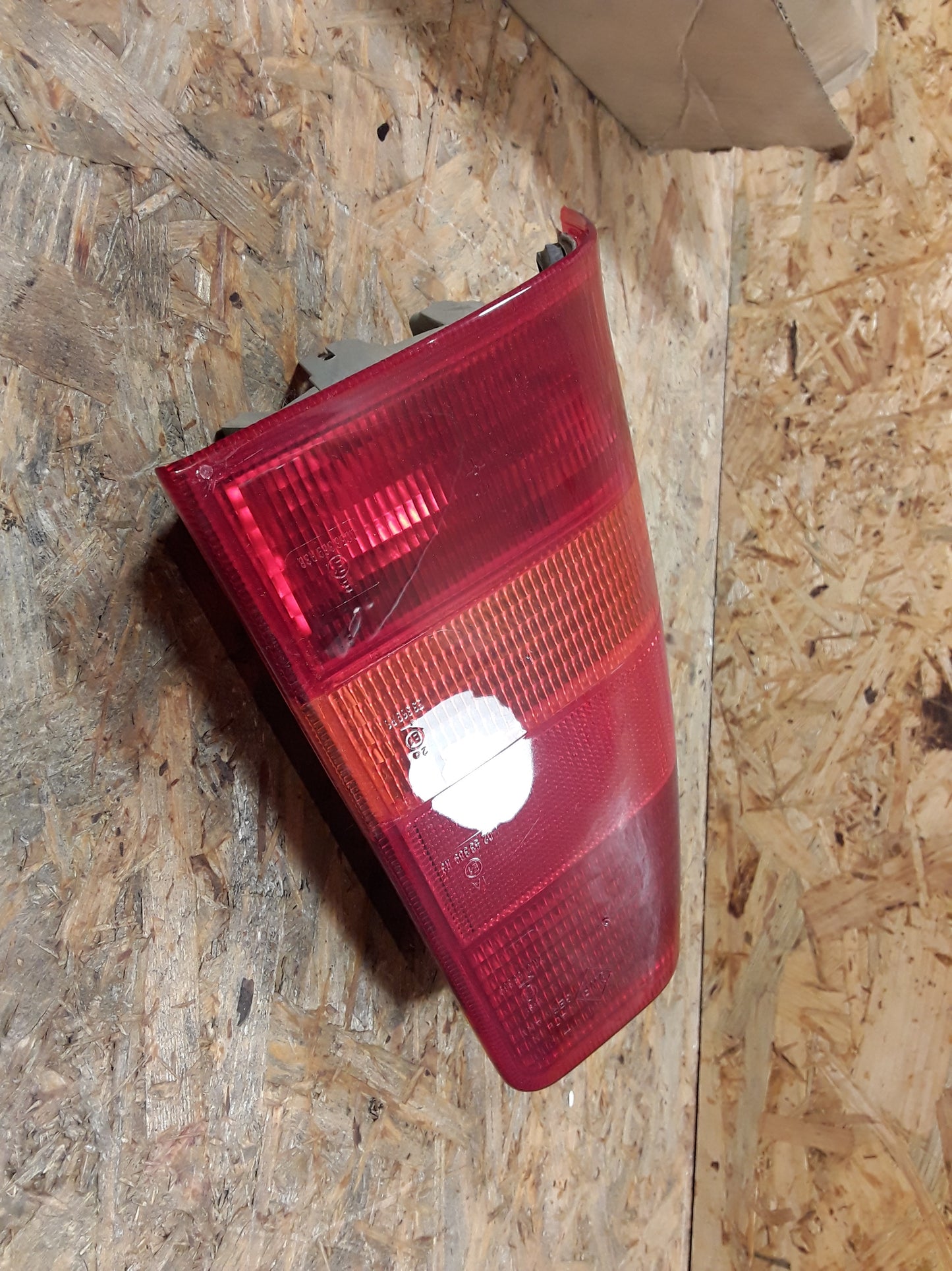 Kadett E Heckleuchte links original GM Opel NEU