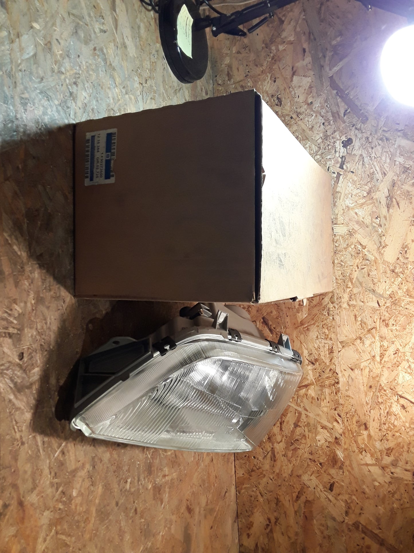 Omega A Scheinwerfer vorne links original GM Opel NEU