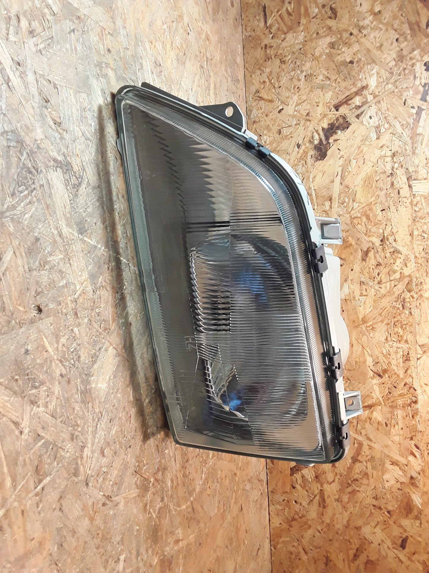 Omega A Scheinwerfer vorne links original GM Opel NEU