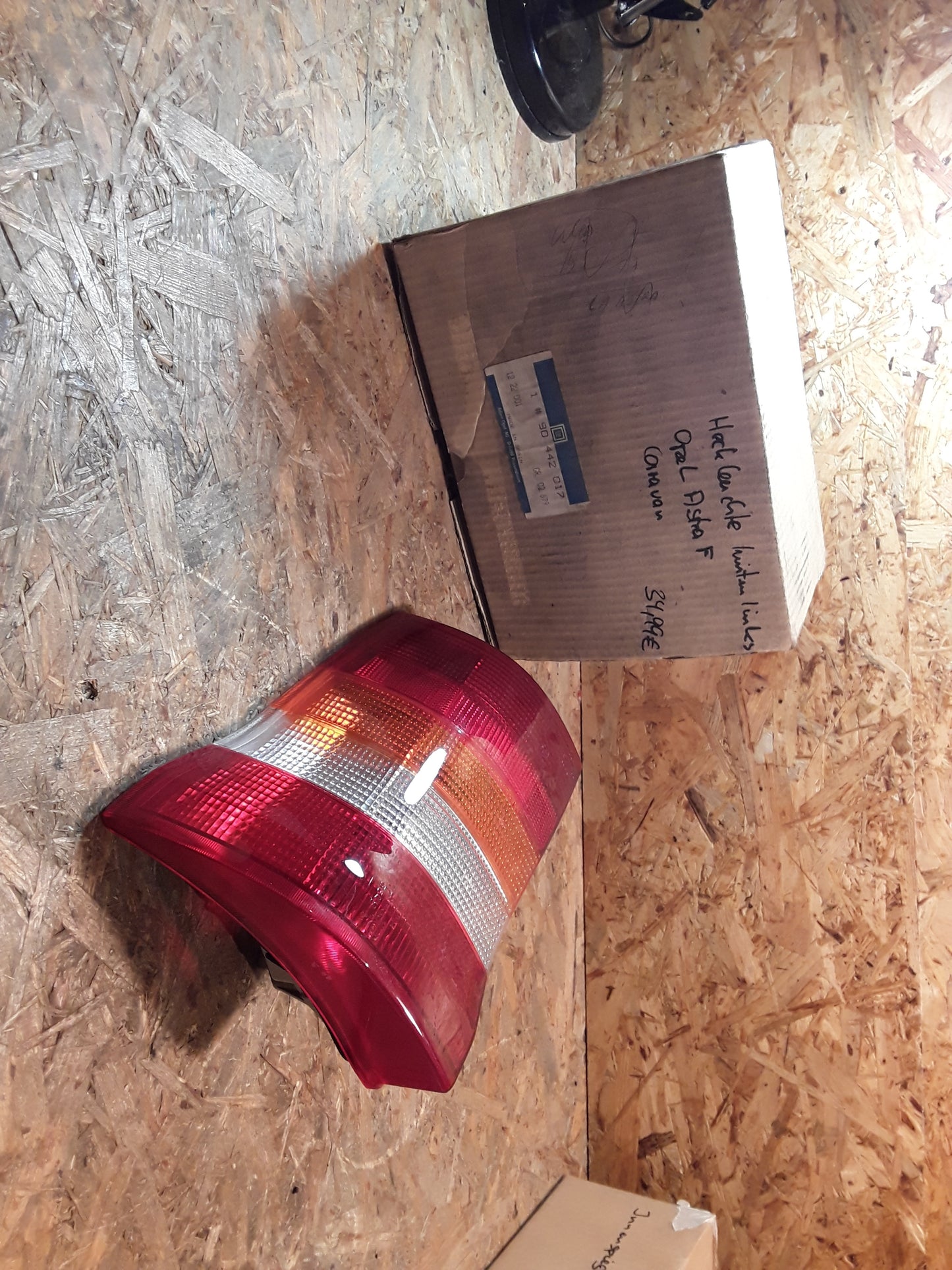 Astra F Caravan Heckleuchte links original GM Opel NEU