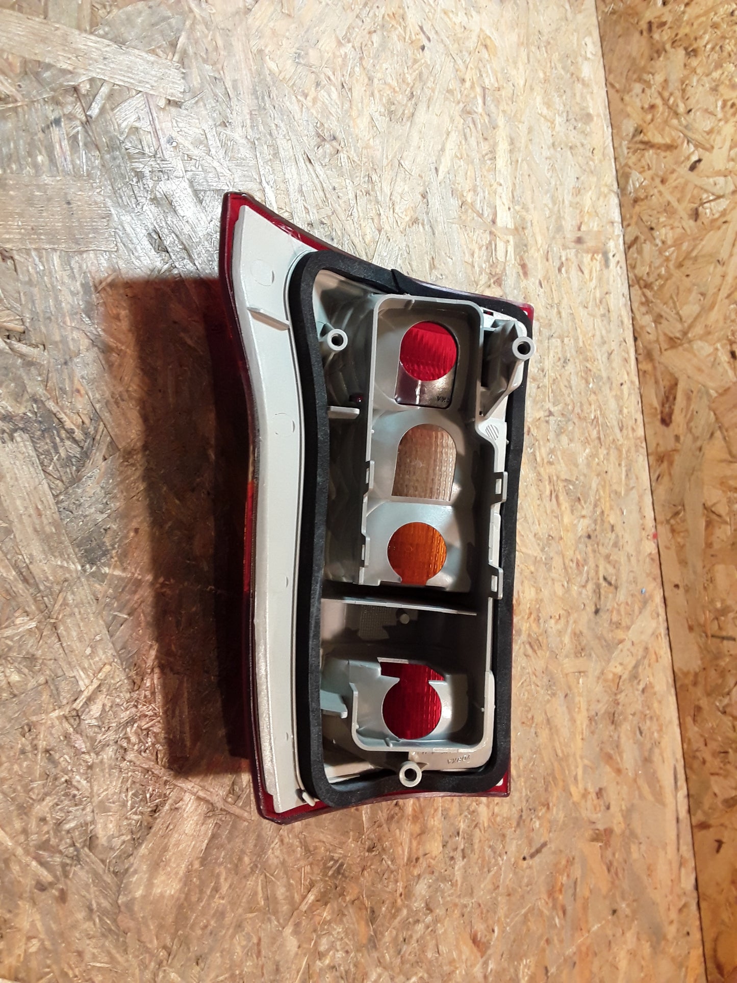 Astra F Caravan Heckleuchte links original GM Opel NEU