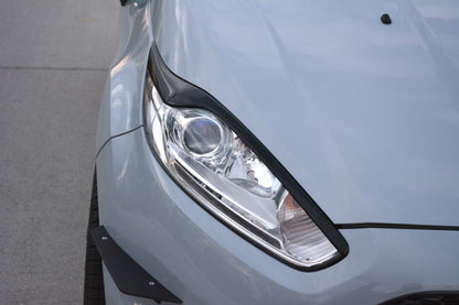 Scheinwerfer Blenden Böser Blick V.2 für Ford Fiesta ST / ST-Line / Standard Mk7 FL schwarz Hochglanz