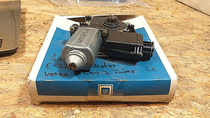 Astra F 3-Türer E-Fenstermotor vorne links original GM Opel NEU