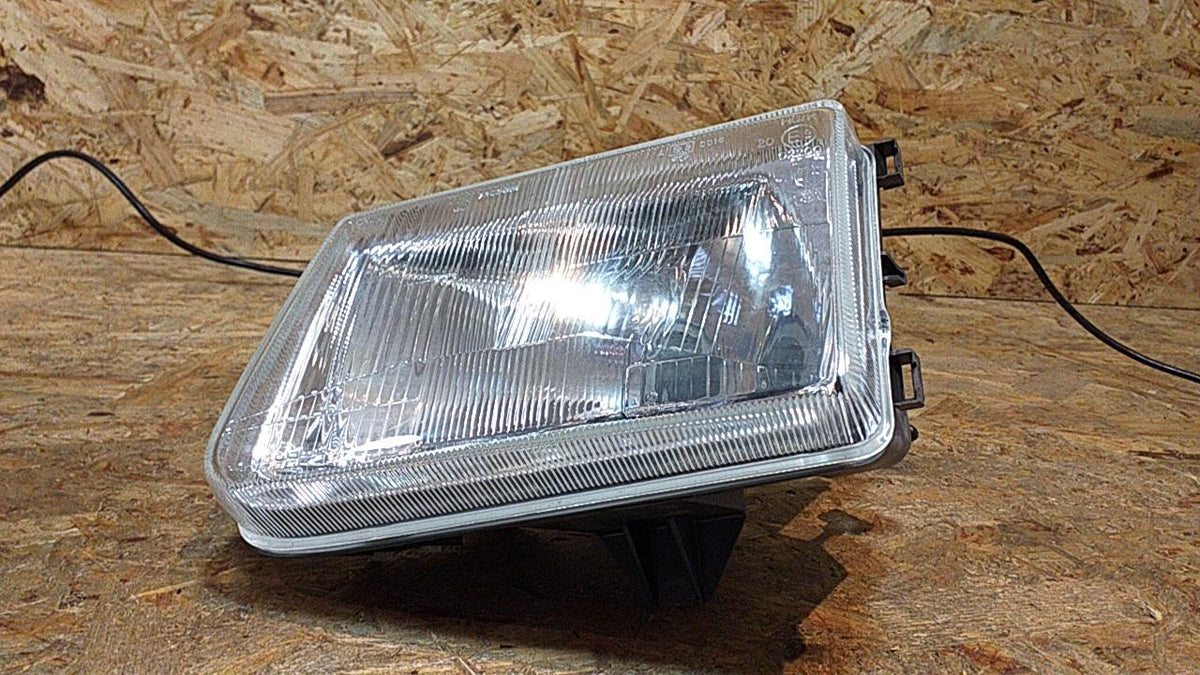 Corsa A Scheinwerfer links original GM Opel NEU