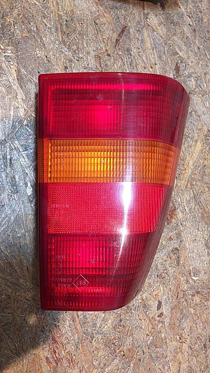 Kadett E Heckleuchte links original GM Opel NEU