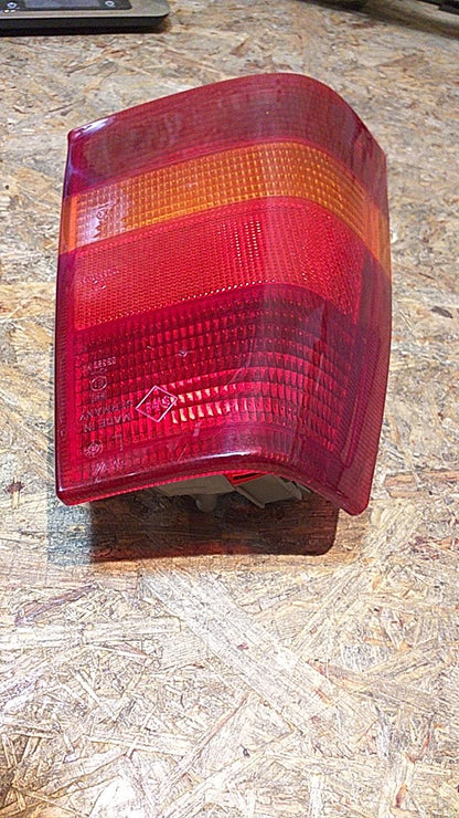 Kadett E Heckleuchte links original GM Opel NEU