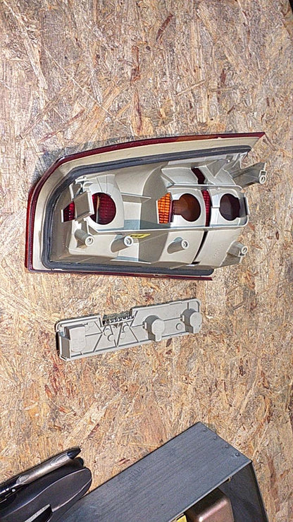 Kadett E Heckleuchte links original GM Opel NEU