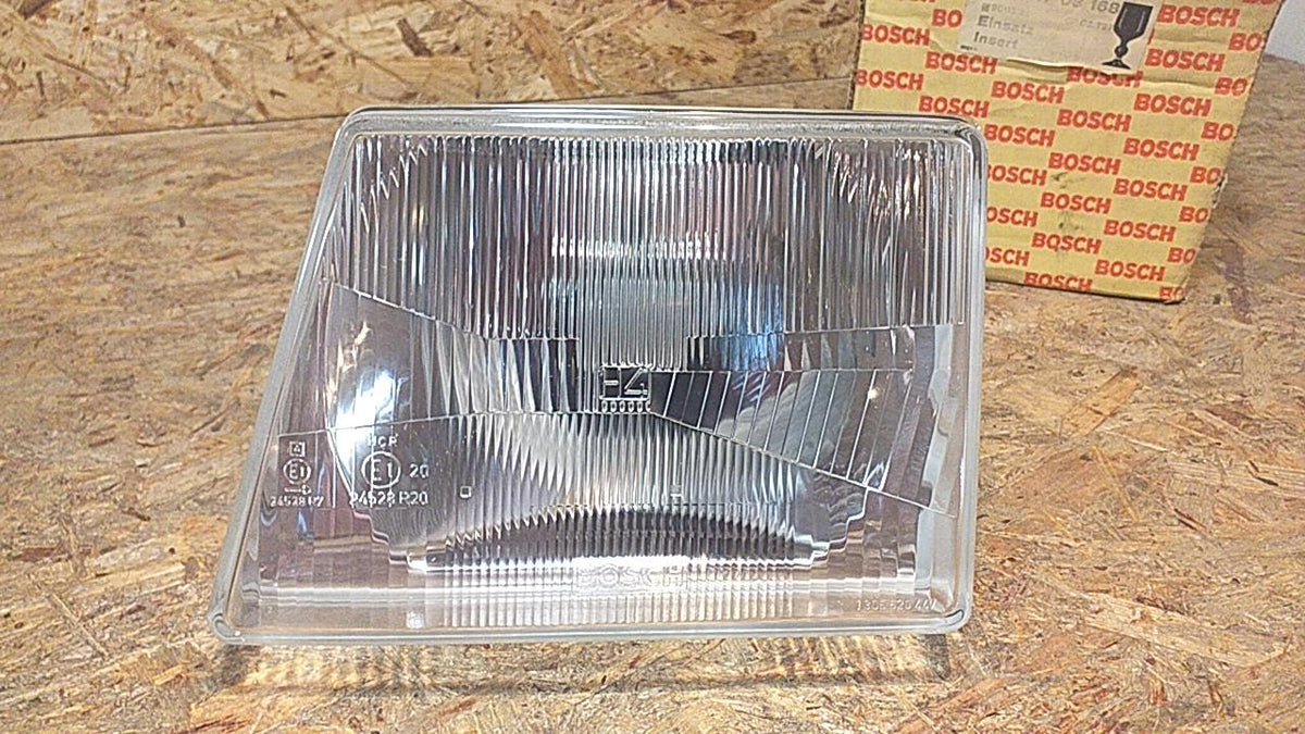 Kadett D Frontscheinwerfer H4 links original Bosch NEU