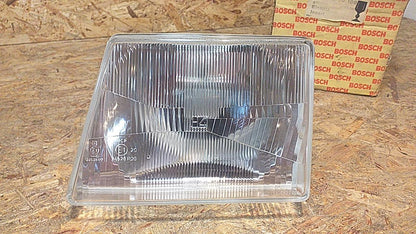 Kadett D Frontscheinwerfer H4 links original Bosch NEU