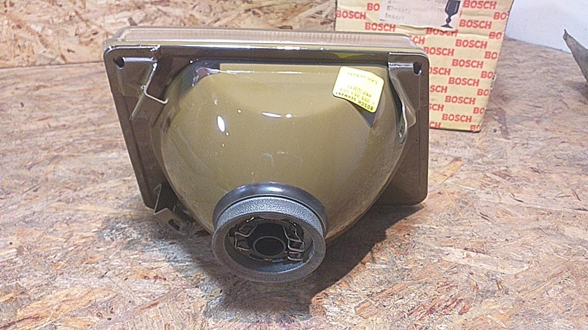 Kadett D Frontscheinwerfer H4 links original Bosch NEU