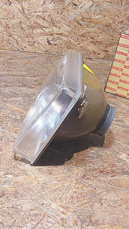 Kadett D Frontscheinwerfer H4 links original Bosch NEU