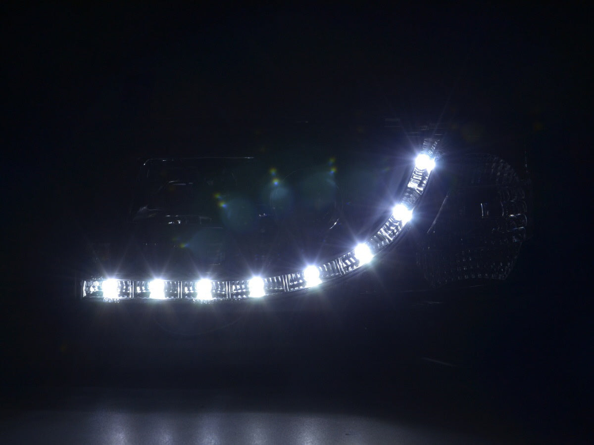 Scheinwerfer Set Daylight LED TFL-Optik VW Bus Typ T4 Bj. 90-03 schwarz für Rechtslenker