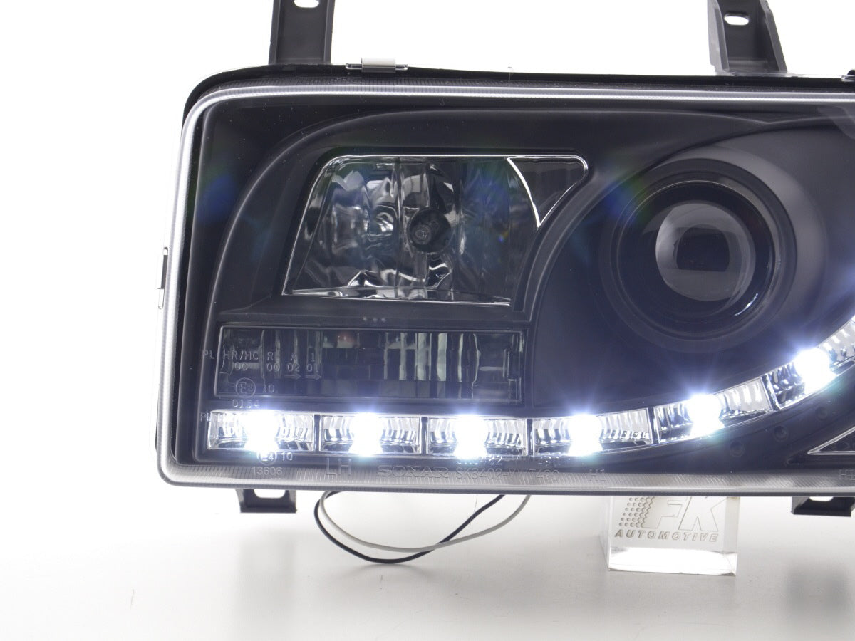 Scheinwerfer Set Daylight LED TFL-Optik VW Bus Typ T4 Bj. 90-03 schwarz für Rechtslenker