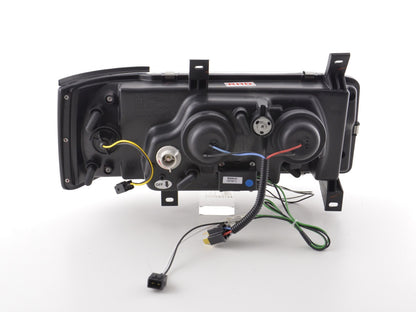 Scheinwerfer Set Daylight LED TFL-Optik VW Bus Typ T4 Bj. 90-03 schwarz für Rechtslenker