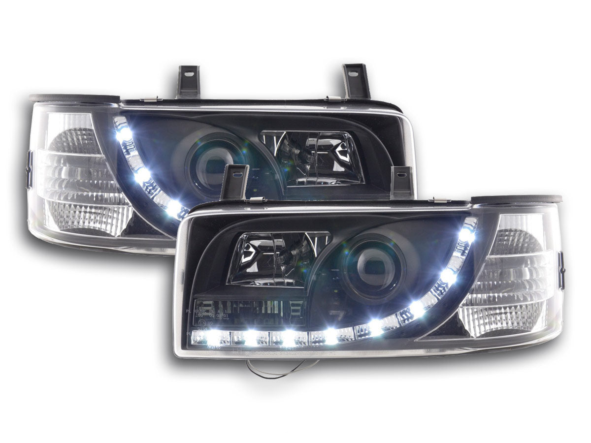 Scheinwerfer Set Daylight LED TFL-Optik VW Bus Typ T4 Bj. 90-03 schwarz für Rechtslenker