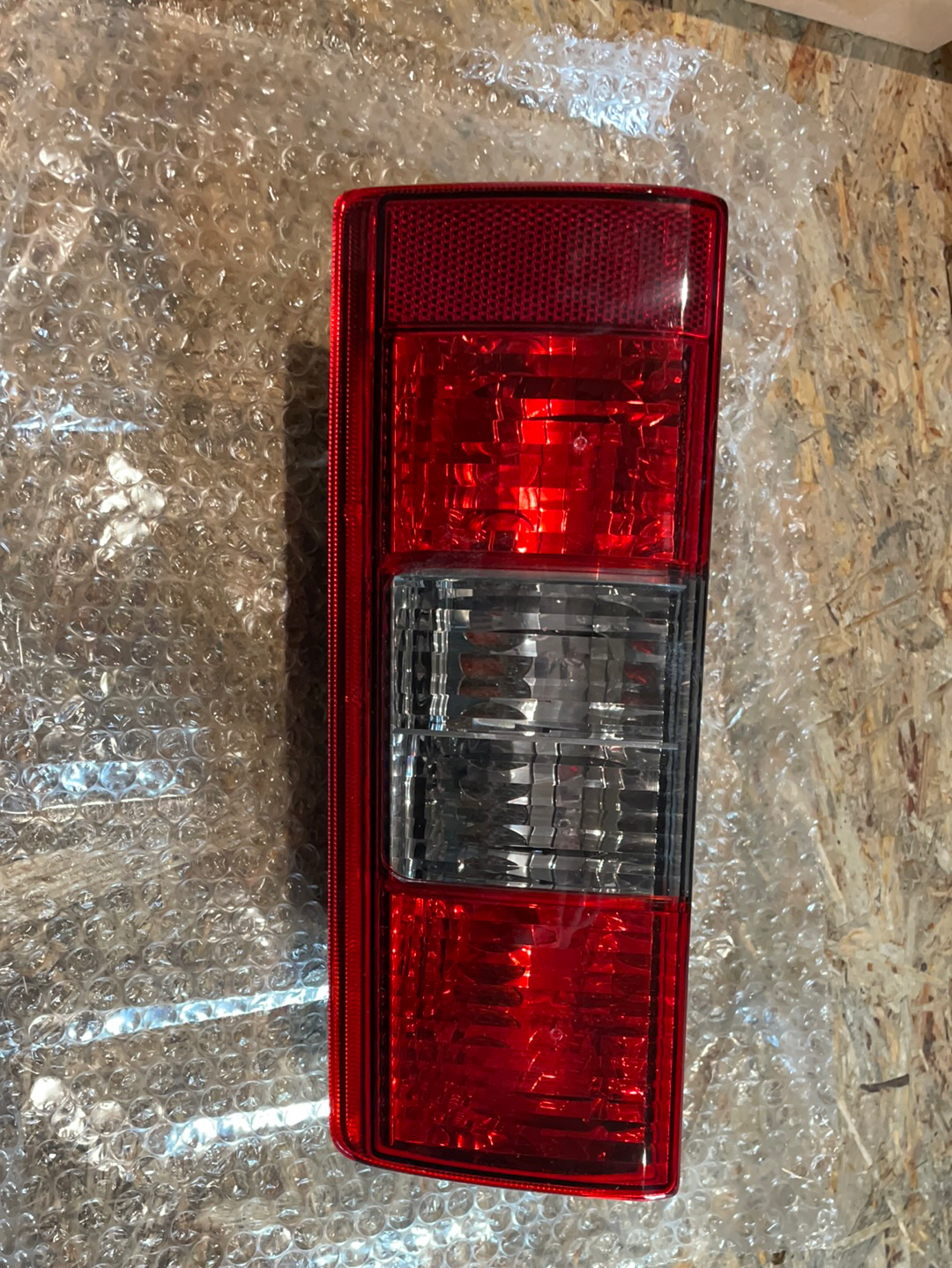 Original GM Opel Combo C Heckleuchte links Neu