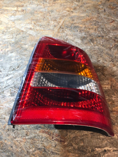 Original GM Opel Astra G Caravan Limousine T98 F69 1.6 Heckleuchte rechts Neu