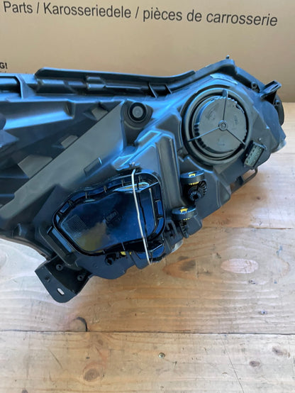 Original GM Opel Corsa D Scheinwerfer H7/H1 links Linksverkehr Neu