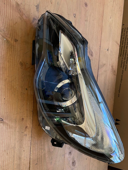 Original GM Opel Corsa D Scheinwerfer links Halogen Neu