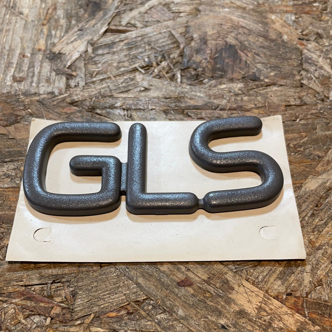 Original GM Opel Kadett E GLS Schriftzug/ Emblem grau Neu