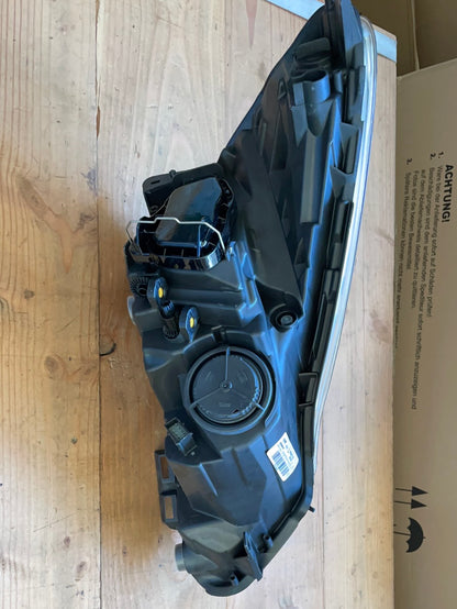 Original GM Opel Corsa D Scheinwerfer H7/H1 links Linksverkehr Neu